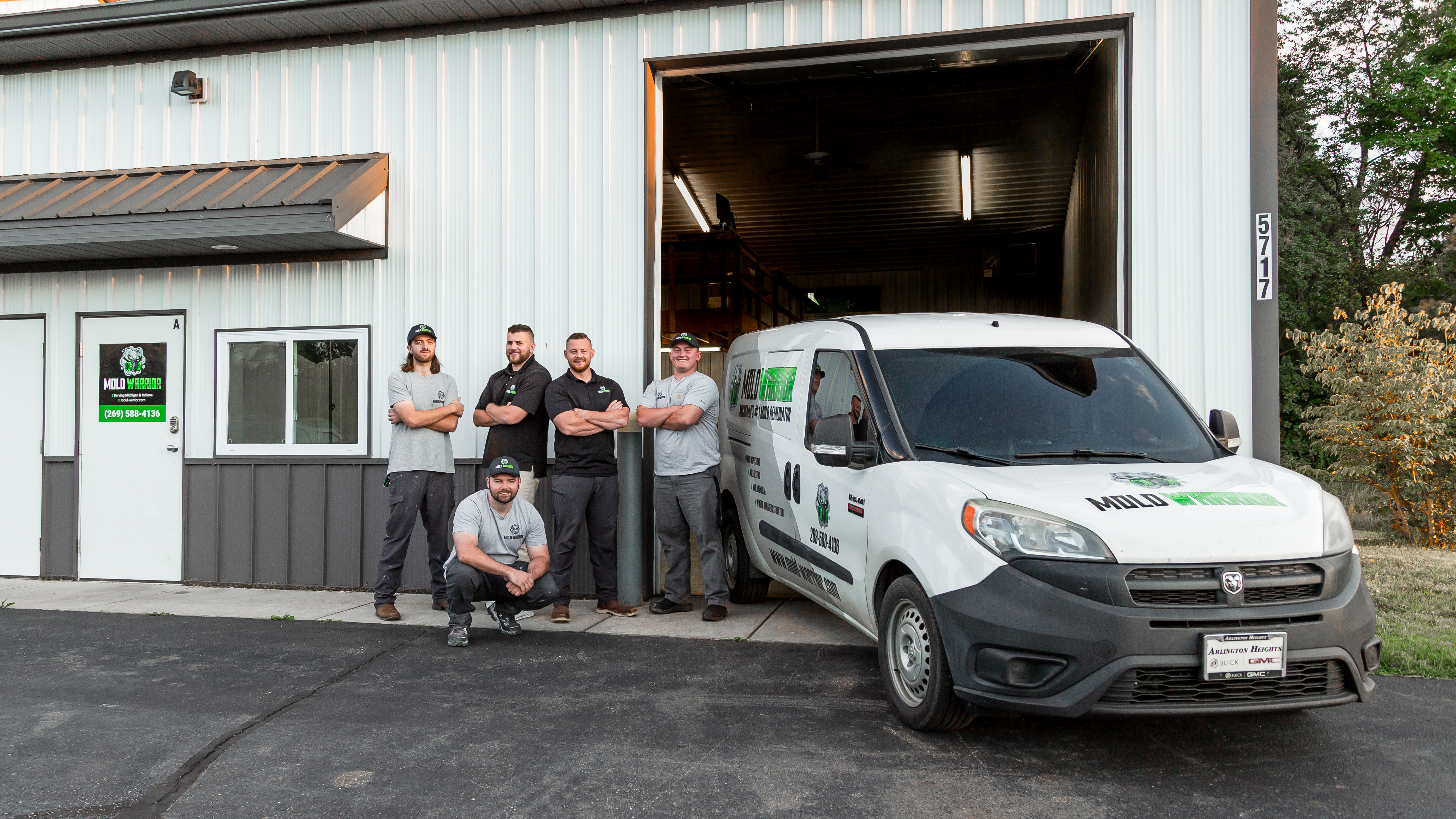 The Mold Warrior team with their branded service van